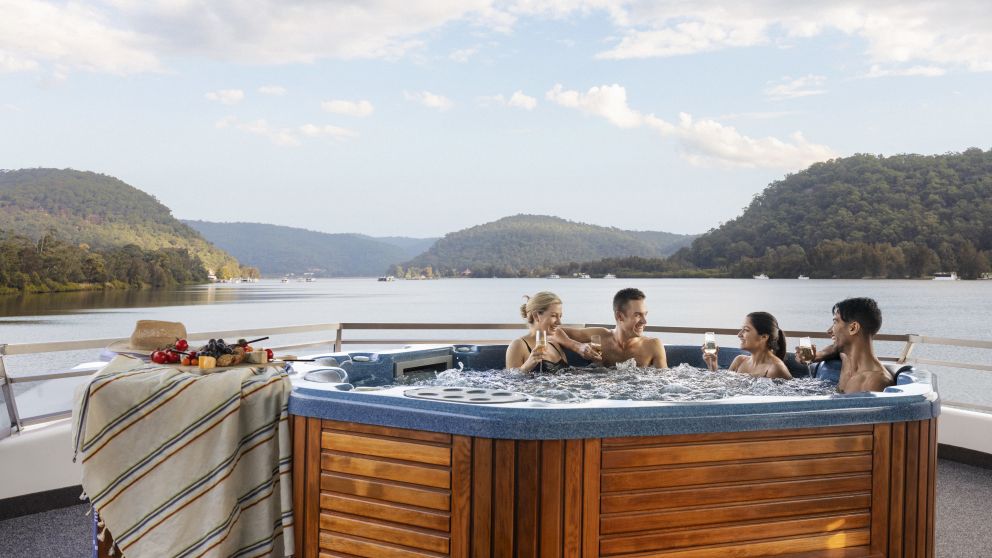 Friends enjoying a stay on an Able Hawkesbury River Houseboats vessel in Wisemans Ferry, Hawkesbury