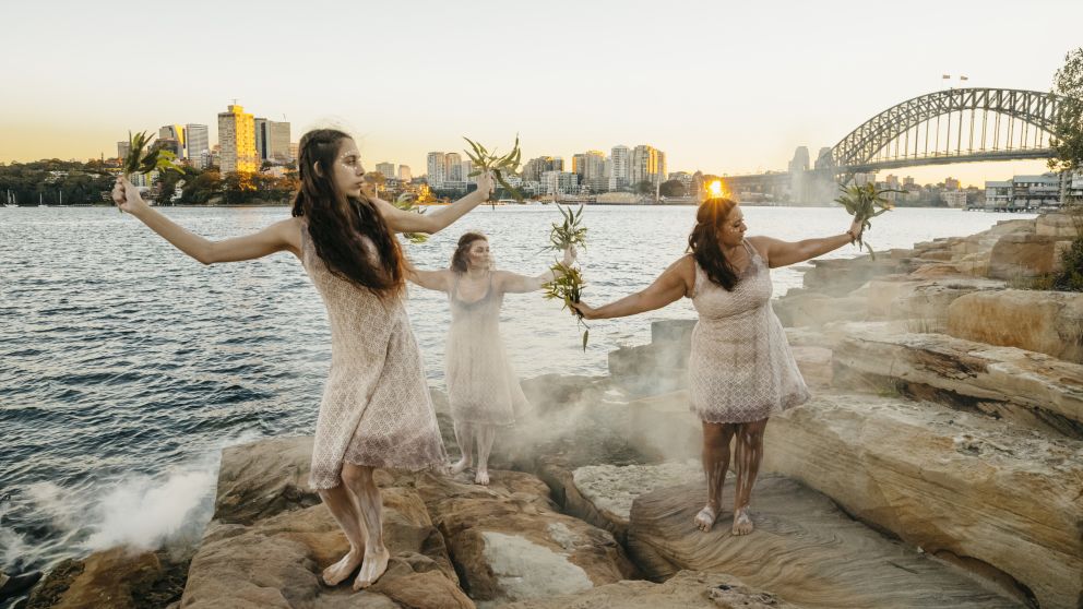Aboriginal dancers sharing an immersive cultural experience during an Aboriginal Cultural Tour in Barangaroo, Sydney City