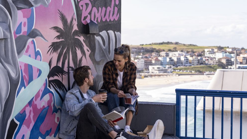 Couple relaxing at Noahs Bondi, Bondi Beach