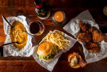 Mary's Newtown, Newtown Potato and gravy, wine, cheeseburger, fries, fried chicken and a Bloody Burger Mary from Mary's Newtown, Newtown