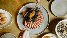 Yan, Wolli Creek - Credit: Yan Smoked pork cutlet, sticky soy glaze, calvo nero, egg yolk at Yan, Wolli Creek