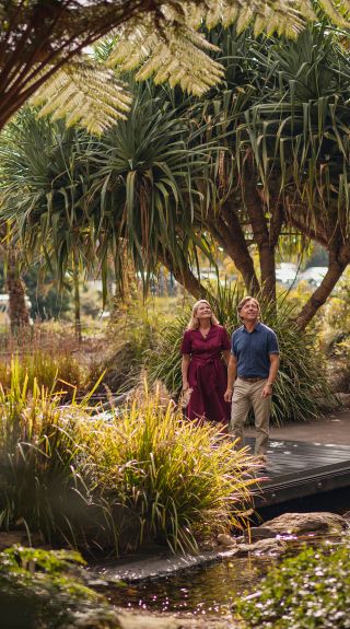 Couple walking in The Australian Botanic Garden in Mount Annan, NSW