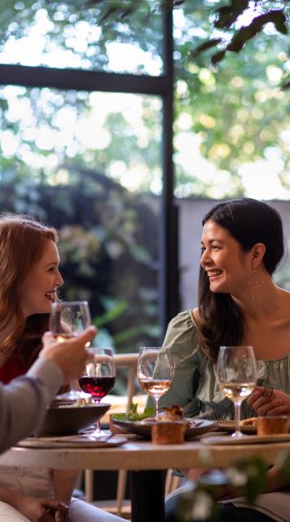 Friends enjoying Middle Eastern cuisine at Nour Restaurant, Surry Hills