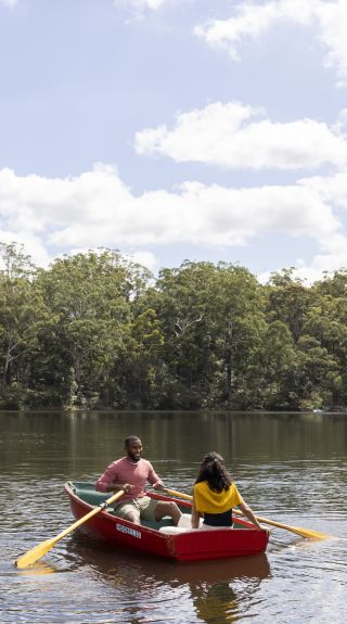 Couple enjoying a day out on Hunts Creek, Parramatta with Parramatta Rowboats, Sydney West