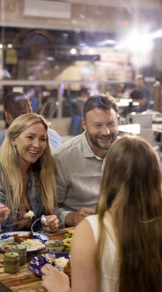 Family enjoying food and drink at Avasana Afghan Street Food, Merrylands, Sydney West