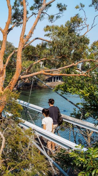 Couple enjoying a scenic walk around Parsley Bay, Vaucluse