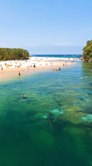 People enjoying swimming at Wattamolla, Royal National Park Sydney