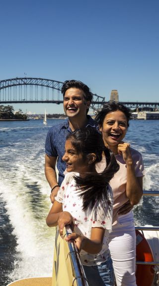 Family enjoying harbour views aboard the Shopper Hopper ferry service to Birkenhead Point Brand Outlet centre