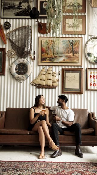 Couple enjoying beers at Willie The Boatman, St. Peters