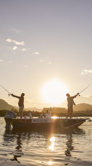 Friends enjoying an afternoon of fishing on the Hawkesbury River, Wisemans Ferry