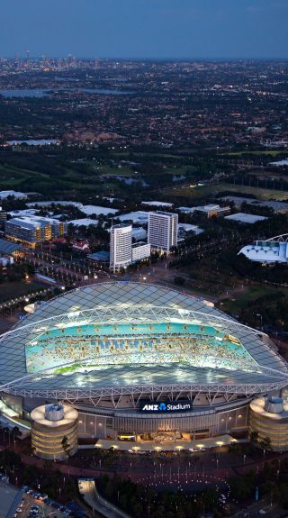 Aerial of ANZ Stadium at Sydney Olympic Park at dusk