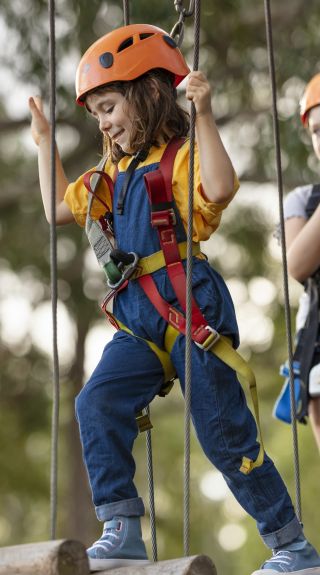 Young girl enjoying the action at TreeTops Adventure Park, Abbotsbury in Sydney's south west