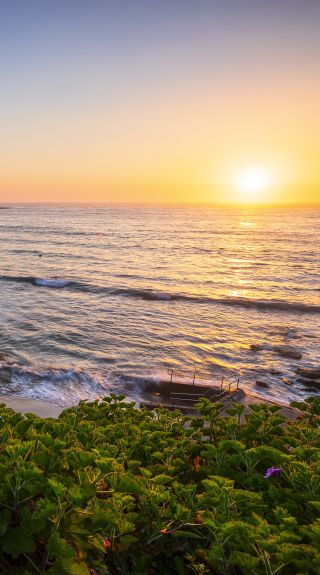 Morning sun rising over Bondi Beach, Sydney east