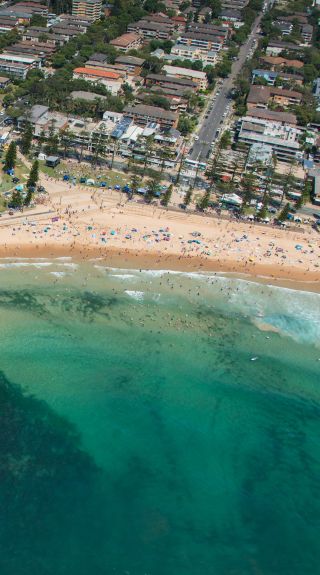 Crowds celebrating Australia Day at Dee Why Beach in Northern Beaches, Sydney North