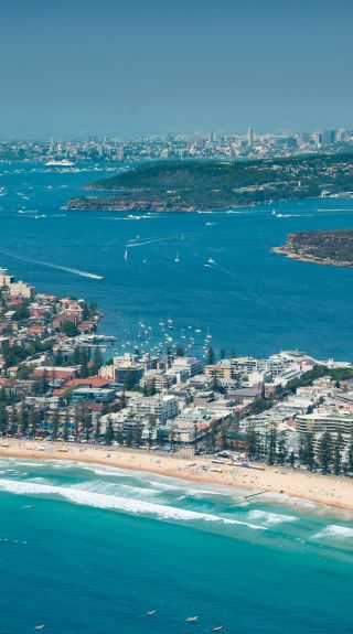 Crowds celebrating Australia Day at Manly Beach