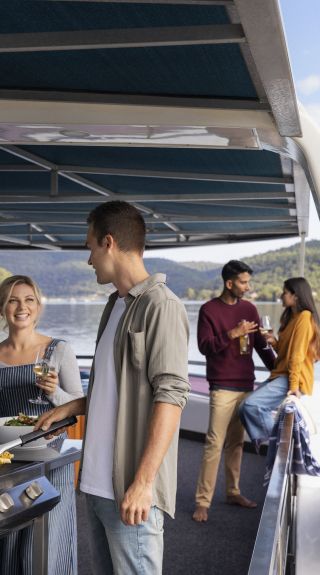 Friends enjoying a stay on an Able Hawkesbury River Houseboats vessel in Wisemans Ferry, Hawkesbury