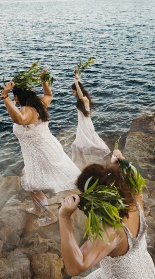 Aboriginal dancers sharing an immersive cultural experience during an Aboriginal Cultural Tour in Barangaroo, Sydney City