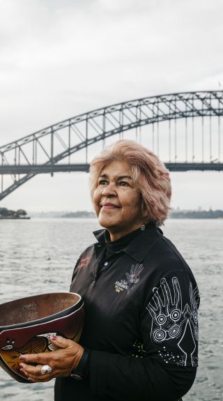 Margert Campbell performing a smoking ceremony at Blues Point Reserve, Blues Point in Sydney as part of the Dreamtime Southern X experience