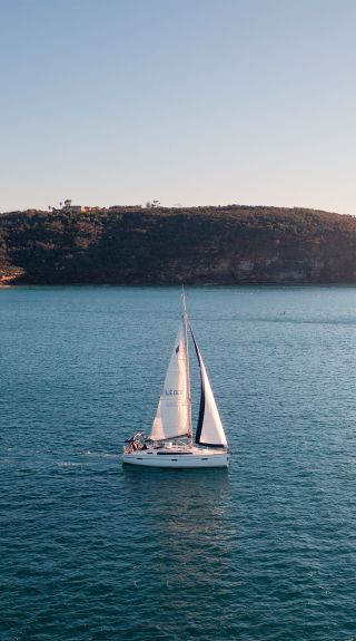 Yacht sailing through North Harbour, Sydney
