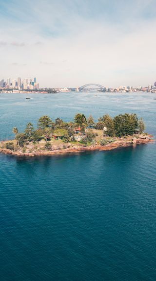 Scenic views across Sydney Harbour to Sydney CBD from Shark Island, Sydney Harbour
