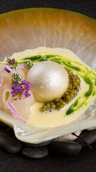 Koi Experiential’s Paspaley, with salted walnut gelato, Paspaley pearl meat, N25 Gold Oscietra caviar, creme fraiche and chive oil, Chippendale - Credit: Tery Gunata