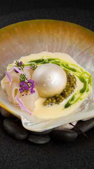 Koi Experiential’s Paspaley, with salted walnut gelato, Paspaley pearl meat, N25 Gold Oscietra caviar, creme fraiche and chive oil, Chippendale - Credit: Tery Gunata