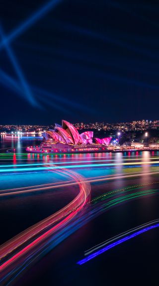 The Sydney Opera House illuminated by the Austral Flora Ballet light projection, Vivid Sydney 2019.