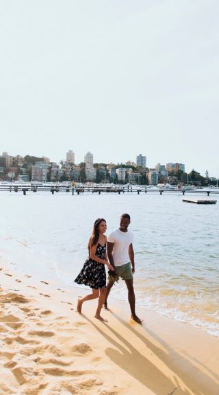 Couple enjoying a walk by Murray Rose Pool, Double Bay