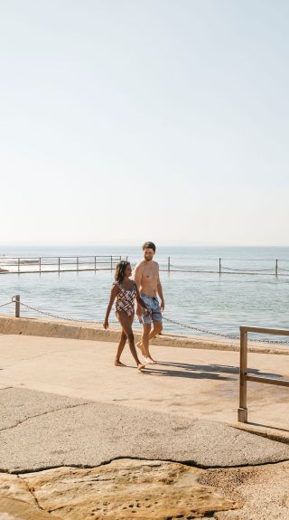 Couple enjoying a day in sun, Cronulla Rock Pool, Cronulla