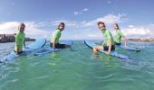 Lets Go Surfing surf school students enjoying their lesson at Bondi Beach, Bondi