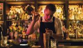 Bartender creating a cocktail at The Doss House bar in The Rocks, Sydney City 