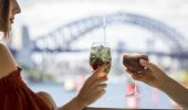 Friends enjoying drinks with a view at Hacienda Bar, Pullman Quay Grand Sydney Harbour, Sydney City