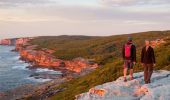 A couple enjoying cliff top views at the Royal National Park Coastal Walk at dawn, Royal National Park - Credit: Royal National Park