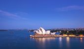Sydney Opera House sails lit up for the evening in Sydney Harbour, Sydney