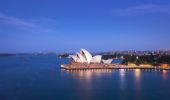 Sydney Opera House sails lit up for the evening in Sydney Harbour, Sydney