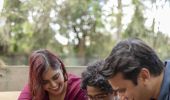 Family feeding a wallaby at Featherdale Wildlife Park, Doonside in Sydney's west