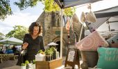 Woman browsing homewares at Balmain Markets in Balmain