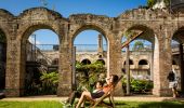 Couple relaxing in the heritage-listed Paddington Reservoir Gardens in Paddington, Sydney