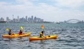 Friends enjoying a day of kayaking on Sydney Harbour