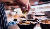 Chef making a bowl of ramen at the Rising Sun Workshop cafe in Newtown, Inner Sydney