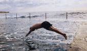 Man enjoying a morning swim at Wylies Baths - Coogee - Sydney East	