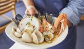 Warm Shellfish with Parsley, Chilli, Olive Oil, Garlic and Lemon Juice dish available at Bannisters by the Sea in Mollymook Beach, South Coast