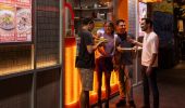 Friends enjoy delicious food during a Chinatown Street Tour, Local Sauce Tours, Haymarket
