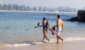 A couple enjoys snorkelling, Shelly Beach, Manly