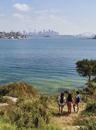 Friends enjoying scenic harbour views along the Hermitage Foreshore Track, Vaucluse