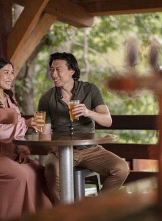 Couple enjoying a beer at George IV Inn in Picton, Sydney west