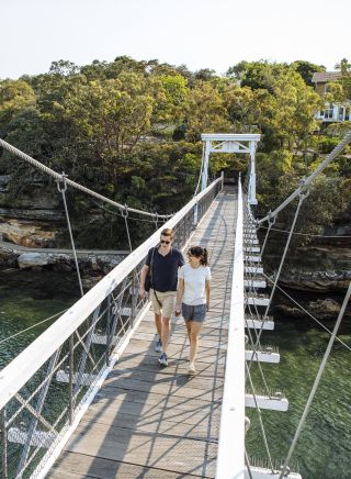 Couple enjoying a scenic walk around Parsley Bay, Vaucluse