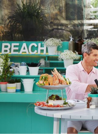Couple enjoying a seafood lunch at the Beach Club in Watsons Bay Boutique Hotel 