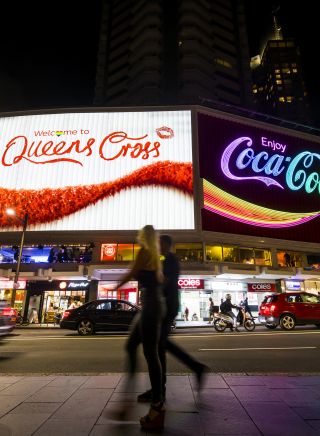 The Coca-Cola sign also known as 'The Coke Sign' lit up for the Mardi Gras weekend in Kings Cross, Sydney