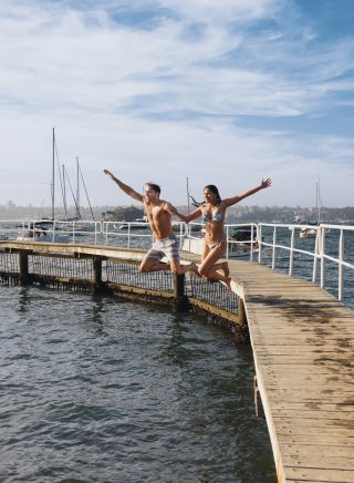 Couple relaxing by Murray Rose Pool in Double Bay, Sydney
